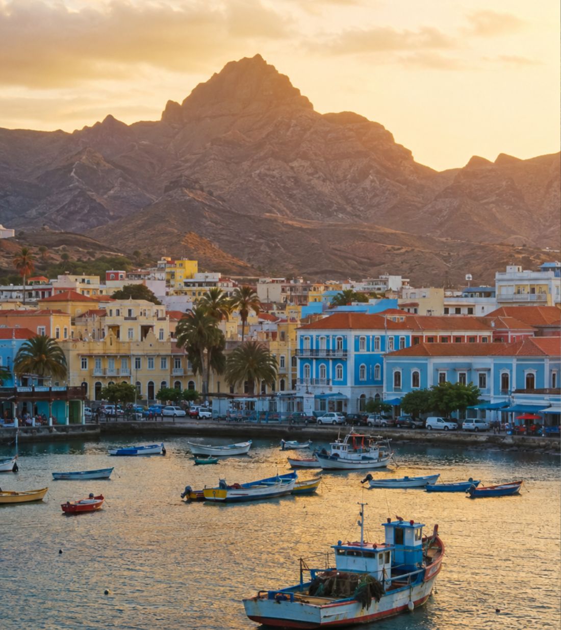 Boats in the harbour of Mindelo at sunset